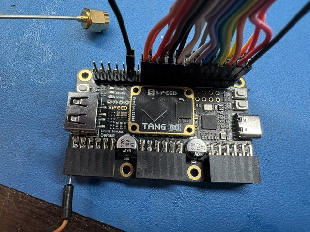 The FPGA development board used for the receiver mux: a 2x20 header carrying the ribbon harness, a USB-C port, debugging silk and a QR code on the board.